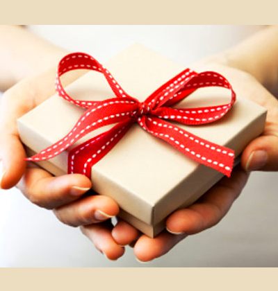 photo of a boxed gift being held